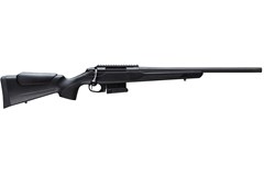 a black and silver rifle