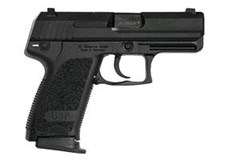 a black handgun with a strap with Springfield Armory in the background