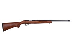 a brown rifle with a black handle