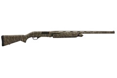 a black and brown rifle