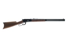 a brown and black rifle