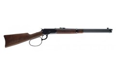 a black and brown rifle