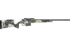 a silver and black rifle