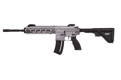 a black rifle with a white background