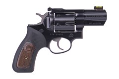 a black handgun with a white background