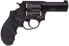 a black handgun with a white background