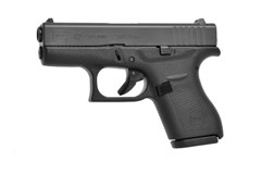 a black handgun with a white background with Springfield Armory in the background